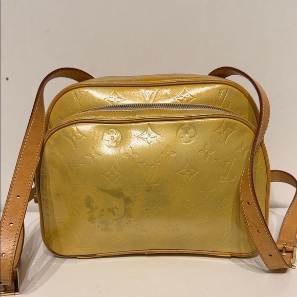 Louis Vuitton Handbags - Louis Vuitton Shimmering Gold Bag-pack. Some stain